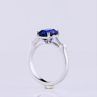 14K White Gold 3-Stone Ring with Cushion Brilliant Cut Lab-Grown Blue Sapphire and Tapered Baguette Diamonds - 3.72 Carat Total Gem Weight - Covaloro Fine Jewelry