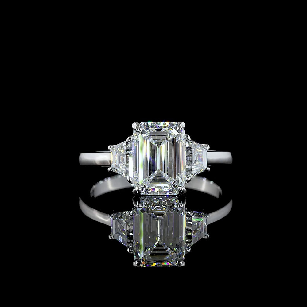 14K White Gold 3-Stone Ring with Emerald Cut Lab Diamond Center (2.07ct) and Trapezoid Side Stones (0.66ct) - 2.73 Carat Total Weight, E-F Color VS1 Clarity - Covaloro Fine Jewelry