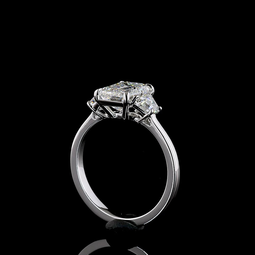 14K White Gold 3-Stone Ring with Emerald Cut Lab Diamond Center (2.07ct) and Trapezoid Side Stones (0.66ct) - 2.73 Carat Total Weight, E-F Color VS1 Clarity - Covaloro Fine Jewelry