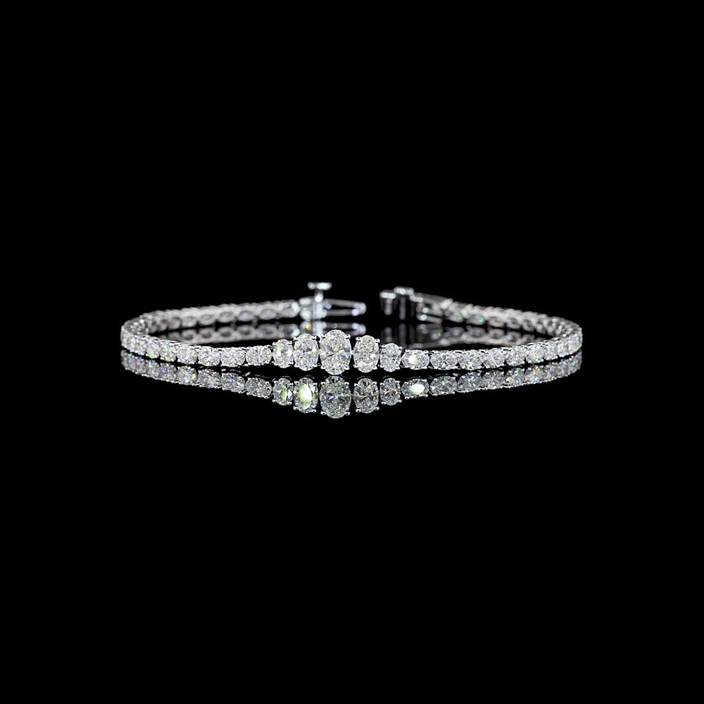 14K White Gold 4.53 Carats Oval Cut Lab Diamond Graduating Riviera Bracelet in Prong Setting - E-F Color, VVS2 Clarity - Covaloro Fine Jewelry
