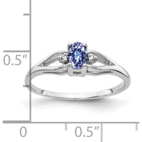 14K White Gold 5x3mm Oval Tanzanite and Diamond Ring with Round Diamonds - 0.27 Carat Tanzanite Weight, 0.01 Carat Diamond Weight by Monteluci Fine Jewelry