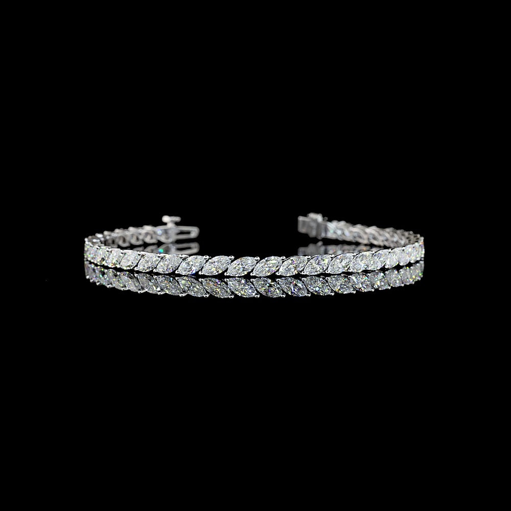 14K White Gold 6.11 Carats Marquise Cut Lab Diamond Tennis Bracelet with Inclined Prong Setting - 38 Stones D VS1 - Covaloro Fine Jewelry