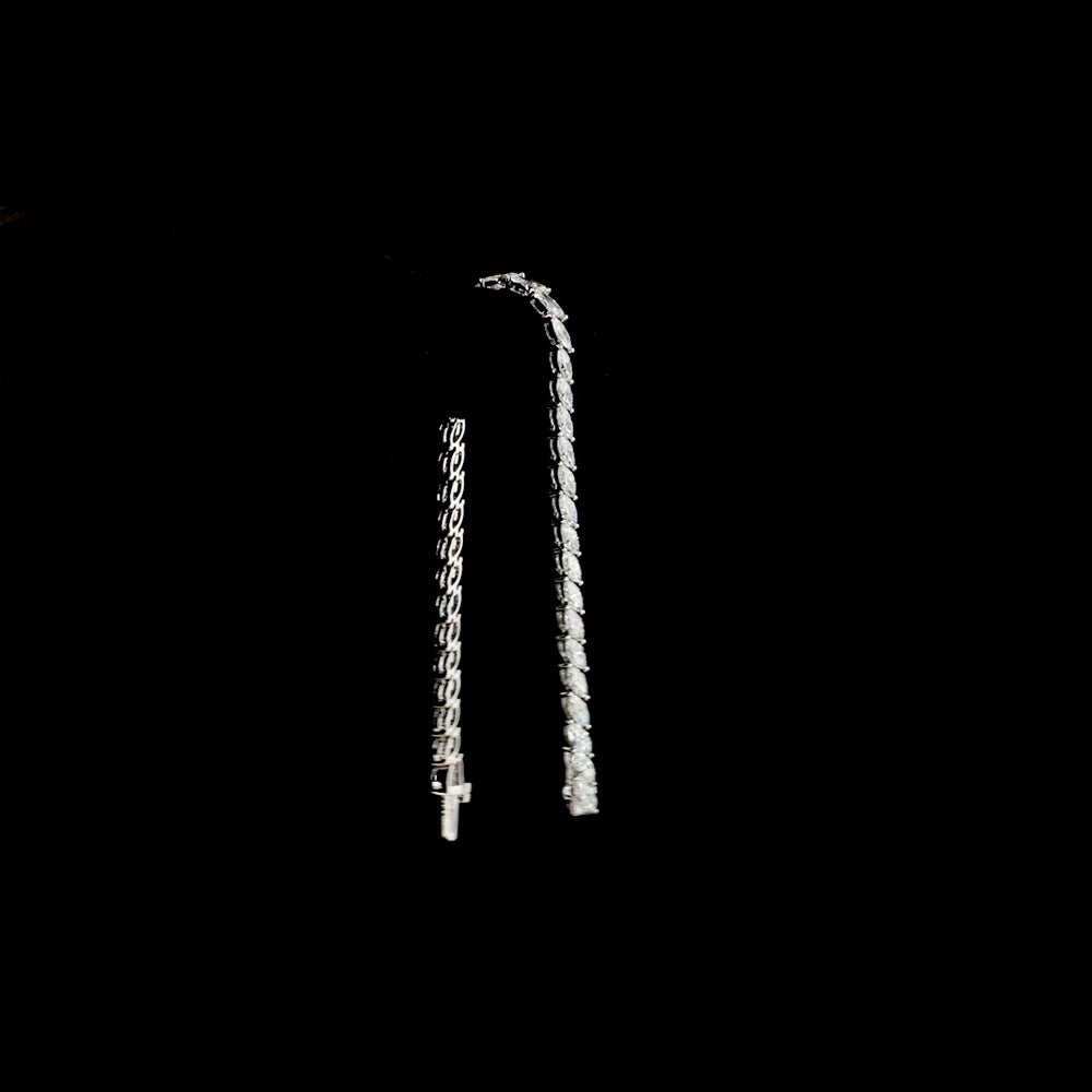 14K White Gold 6.11 Carats Marquise Cut Lab Diamond Tennis Bracelet with Inclined Prong Setting - 38 Stones D VS1 - Covaloro Fine Jewelry