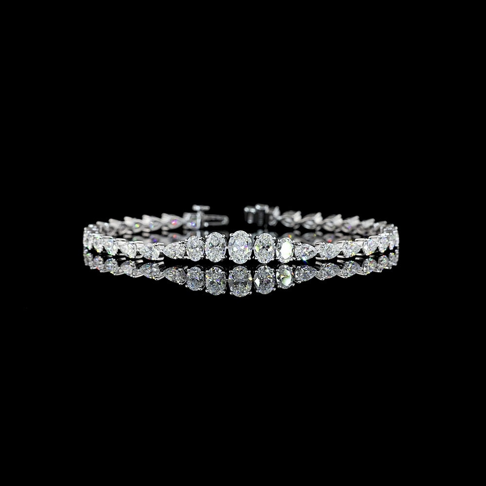 14K White Gold 6.34 Carat Graduated Oval and Pear Cut Lab Diamond Riviera Bracelet - E-F VS Clarity Prong Set - Covaloro Fine Jewelry