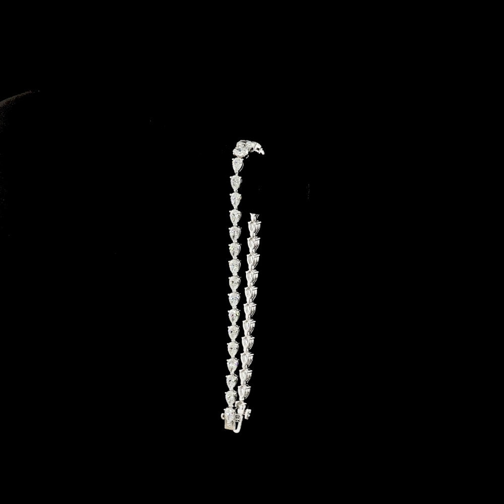 14K White Gold 6.34 Carat Graduated Oval and Pear Cut Lab Diamond Riviera Bracelet - E-F VS Clarity Prong Set - Covaloro Fine Jewelry