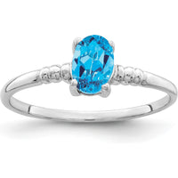 14K White Gold 6x4mm Oval Swiss Blue Topaz Ring - 0.55 Carat Total Topaz Weight by Monteluci Fine Jewelry