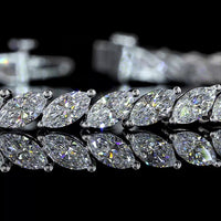 14K White Gold 7.13 Carat Marquise Cut Lab Diamond Tennis Bracelet with Inclined Prong Setting - 42 Stones, E-F Color VS1 Clarity - Covaloro Fine Jewelry