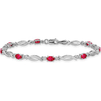 14K White Gold 7.25" Bracelet with Oval Rubies and Round Diamonds - 0.32 Carats Ruby, 0.005 Carats Total Diamond Weight by Monteluci Fine Jewelry