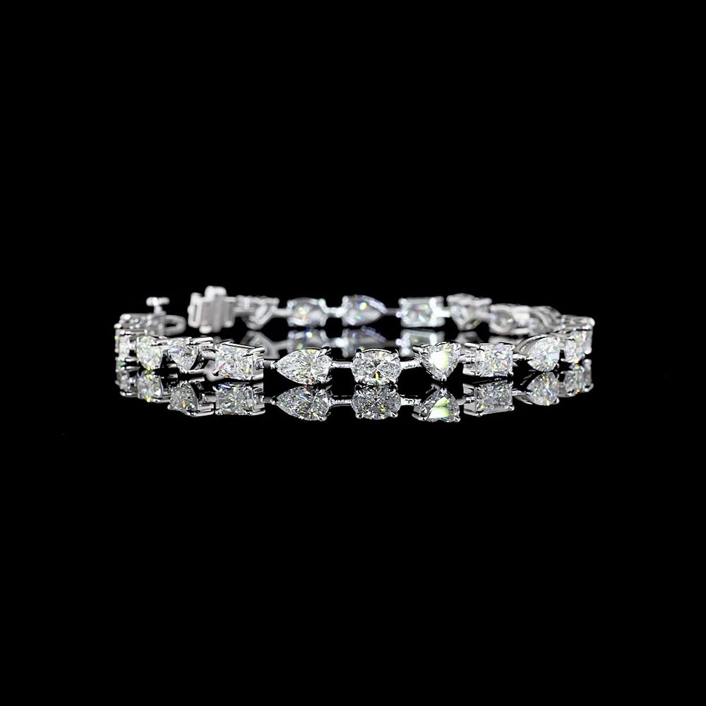 14K White Gold 7.25-Inch Mixed Shape Station Bracelet with Pear, Oval, and Radiant Lab-Grown Diamonds - 9.92 Carat Total Weight - Covaloro Fine Jewelry