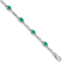 14K White Gold 7.25" Tennis Bracelet with Oval Emeralds and Diamonds - 0.22 Carats Total Gem Weight by Monteluci Fine Jewelry