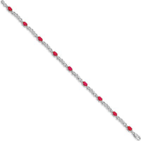 14K White Gold 7.25" Tennis Bracelet with Oval Rubies and Round Diamonds - 0.32 Carats Ruby Weight, 0.01 Carats Diamond Weight by Monteluci Fine Jewelry