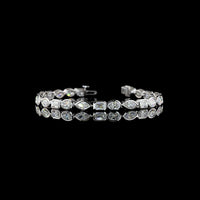 14K White Gold 7.37cttw Emerald Cut Lab Diamond Tennis Bracelet with East-West Bezel Settings - E-F VS1 Quality - Covaloro Fine Jewelry