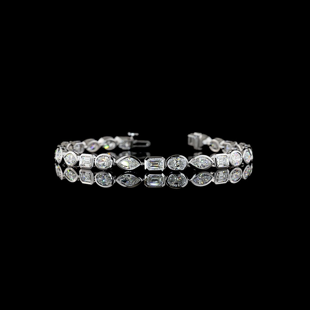 14K White Gold 7.37cttw Emerald Cut Lab Diamond Tennis Bracelet with East-West Bezel Settings - E-F VS1 Quality - Covaloro Fine Jewelry