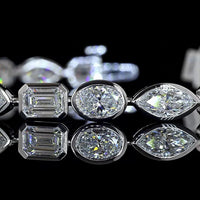 14K White Gold 7.5-Inch Tennis Bracelet with Bezel Set East-West Emerald, Marquise, and Oval Lab Diamonds - 9.87 Carats Total Diamond Weight - Covaloro Fine Jewelry