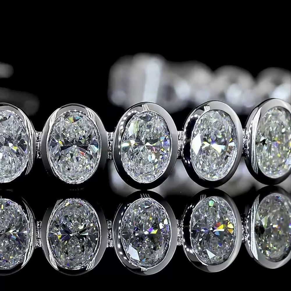 14K White Gold 7.5" Tennis Bracelet with 34 Bezel Set Oval Cut Lab Diamonds - 10.74 Carat Total Weight with E-F Color and VS1 Clarity - Covaloro Fine Jewelry