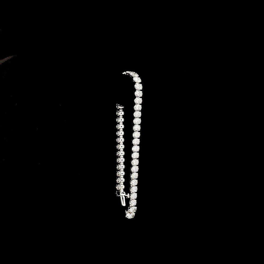 14K White Gold 7.5" Tennis Bracelet with 42 Prong-Set Oval Cut Lab Diamonds - 15.94 Carat Total Weight (E-F Color, VS1 Clarity) - Covaloro Fine Jewelry