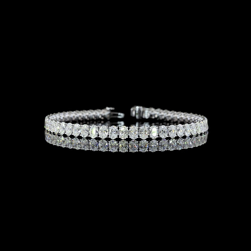 14K White Gold 7.5" Tennis Bracelet with 49 Prong-Set Oval Lab Grown Diamonds - 10.47 Carat Total Diamond Weight, D VS1 Clarity - Covaloro Fine Jewelry