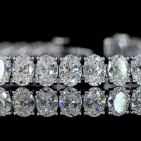 14K White Gold 7.5" Tennis Bracelet with 49 Prong-Set Oval Lab Grown Diamonds - 10.47 Carat Total Diamond Weight, D VS1 Clarity - Covaloro Fine Jewelry
