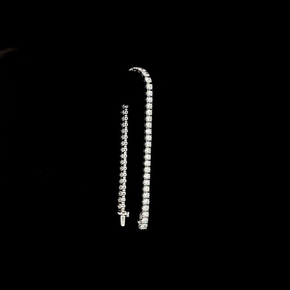 14K White Gold 7.5" Tennis Bracelet with 49 Prong-Set Oval Lab Grown Diamonds - 10.47 Carat Total Diamond Weight, D VS1 Clarity - Covaloro Fine Jewelry