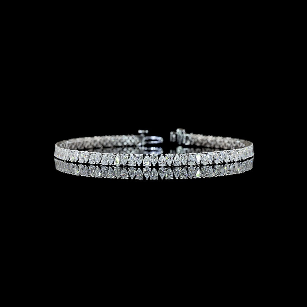 14K White Gold 7.5" Tennis Bracelet with North-South Prong Set Pear Shape Lab Diamonds - 4.73 Carat Total Weight, E-F Color, VS1 Clarity - Covaloro Fine Jewelry