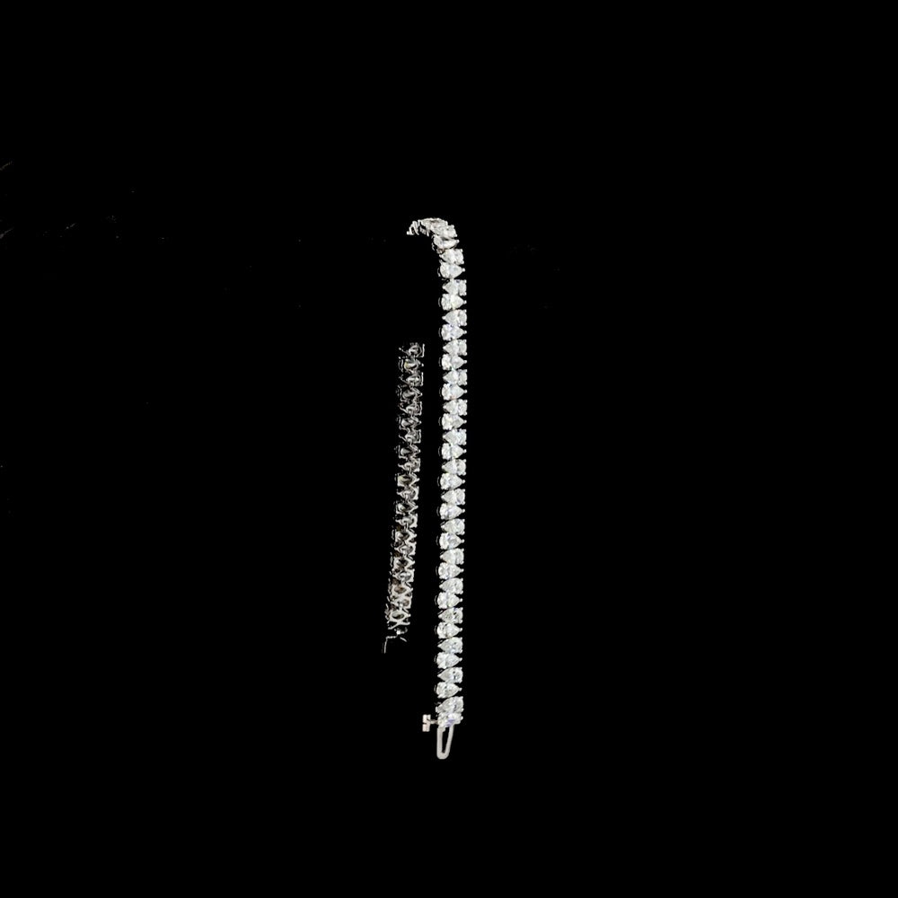 14K White Gold 7.54 Carat Tennis Bracelet with Prong Set Pear Cut Natural Diamonds (E-F Color, VS+ Clarity, 70 Stones) - Covaloro Fine Jewelry