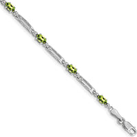 14K White Gold 7" Fancy Link Bracelet with Oval Peridot and Round Diamonds - 0.25 Carats Total Peridot Weight by Monteluci Fine Jewelry