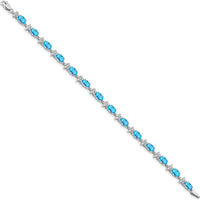 14K White Gold 7" Floral Tennis Bracelet with Swiss Blue Topaz and Diamonds - 0.56 Carats Total Gem Weight by Oro Pregiato