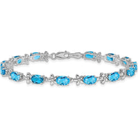 14K White Gold 7" Floral Tennis Bracelet with Swiss Blue Topaz and Diamonds - 0.56 Carats Total Gem Weight by Oro Pregiato