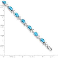 14K White Gold 7" Floral Tennis Bracelet with Swiss Blue Topaz and Diamonds - 0.56 Carats Total Gem Weight by Oro Pregiato