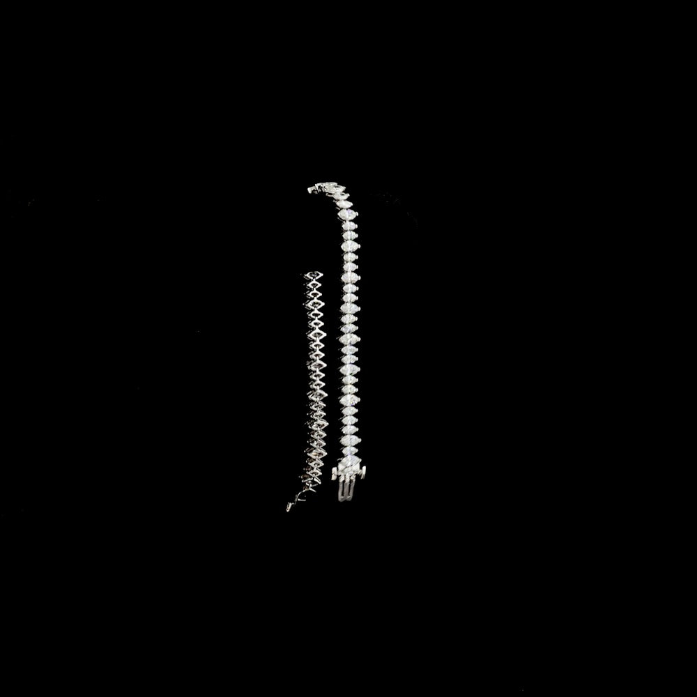 14K White Gold 7-Inch Tennis Bracelet with 66 North-South Marquise Cut Lab Diamonds - 5.60 Carats Total Diamond Weight - Covaloro Fine Jewelry