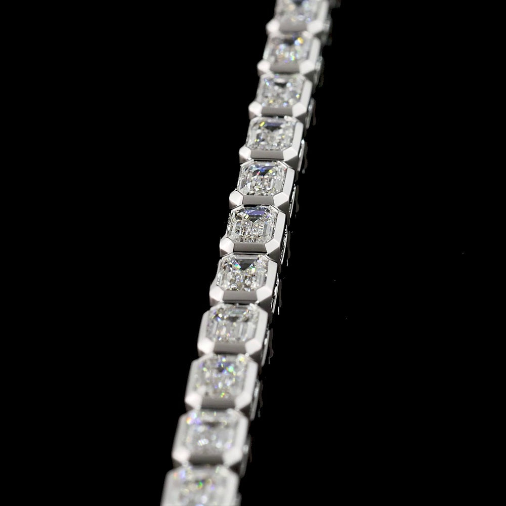 14K White Gold 7-Inch Tennis Bracelet with East-West Bezel Set Emerald Cut Lab Diamonds - 6.33 Carat Total Weight - Covaloro Fine Jewelry