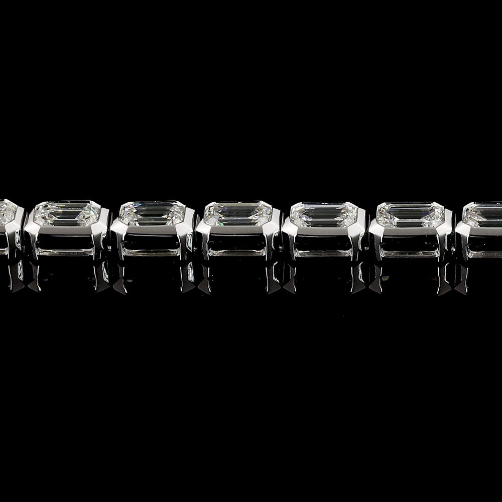 14K White Gold 7-Inch Tennis Bracelet with East-West Bezel Set Emerald Cut Lab Diamonds - 6.33 Carat Total Weight - Covaloro Fine Jewelry