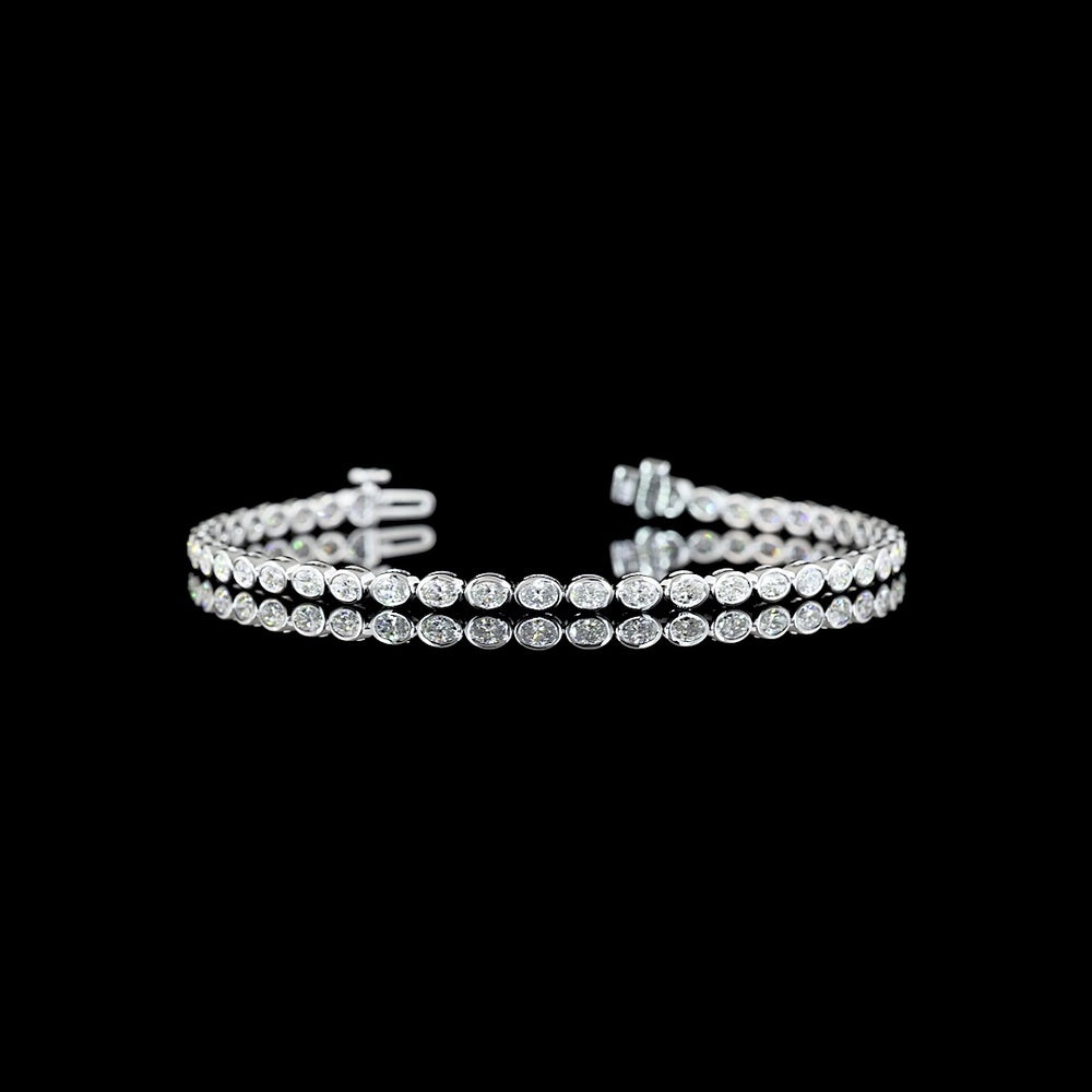 14K White Gold 7-Inch Tennis Bracelet with East-West Bezel Set Oval Lab Diamonds - 2.56 Carat Total Weight - Covaloro Fine Jewelry