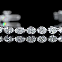 14K White Gold 7-Inch Tennis Bracelet with East-West Bezel Set Oval Lab Diamonds - 2.56 Carat Total Weight - Covaloro Fine Jewelry