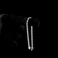 14K White Gold 7-Inch Tennis Bracelet with East-West Bezel Set Oval Lab Diamonds - 2.56 Carat Total Weight - Covaloro Fine Jewelry