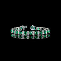 14K White Gold 7-Inch Tennis Bracelet with Prong-Set Oval Lab-Grown Green Emeralds - 4.74 Carat Total Weight - Covaloro Fine Jewelry