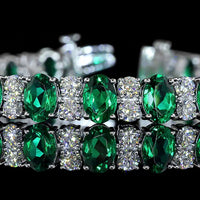14K White Gold 7-Inch Tennis Bracelet with Prong-Set Oval Lab-Grown Green Emeralds - 4.74 Carat Total Weight - Covaloro Fine Jewelry