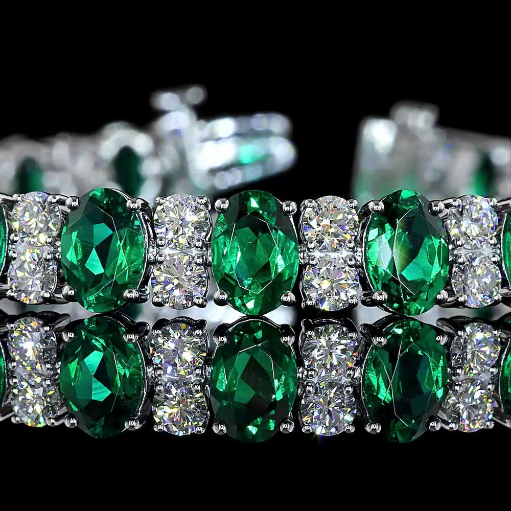 14K White Gold 7-Inch Tennis Bracelet with Prong-Set Oval Lab-Grown Green Emeralds - 4.74 Carat Total Weight - Covaloro Fine Jewelry