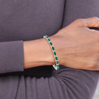 14K White Gold 7" Oval Lab Created Emerald and Diamond Tennis Bracelet - 0.54 Carats Total Emerald Weight, 0.10 Carats Total Diamond Weight by Monteluci Fine Jewelry