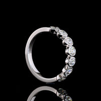 14K White Gold 7-Stone Eternity Band with Bezel Set Oval Lab Diamonds - 1.13 Carat Total Weight E-F VS1 - Covaloro Fine Jewelry