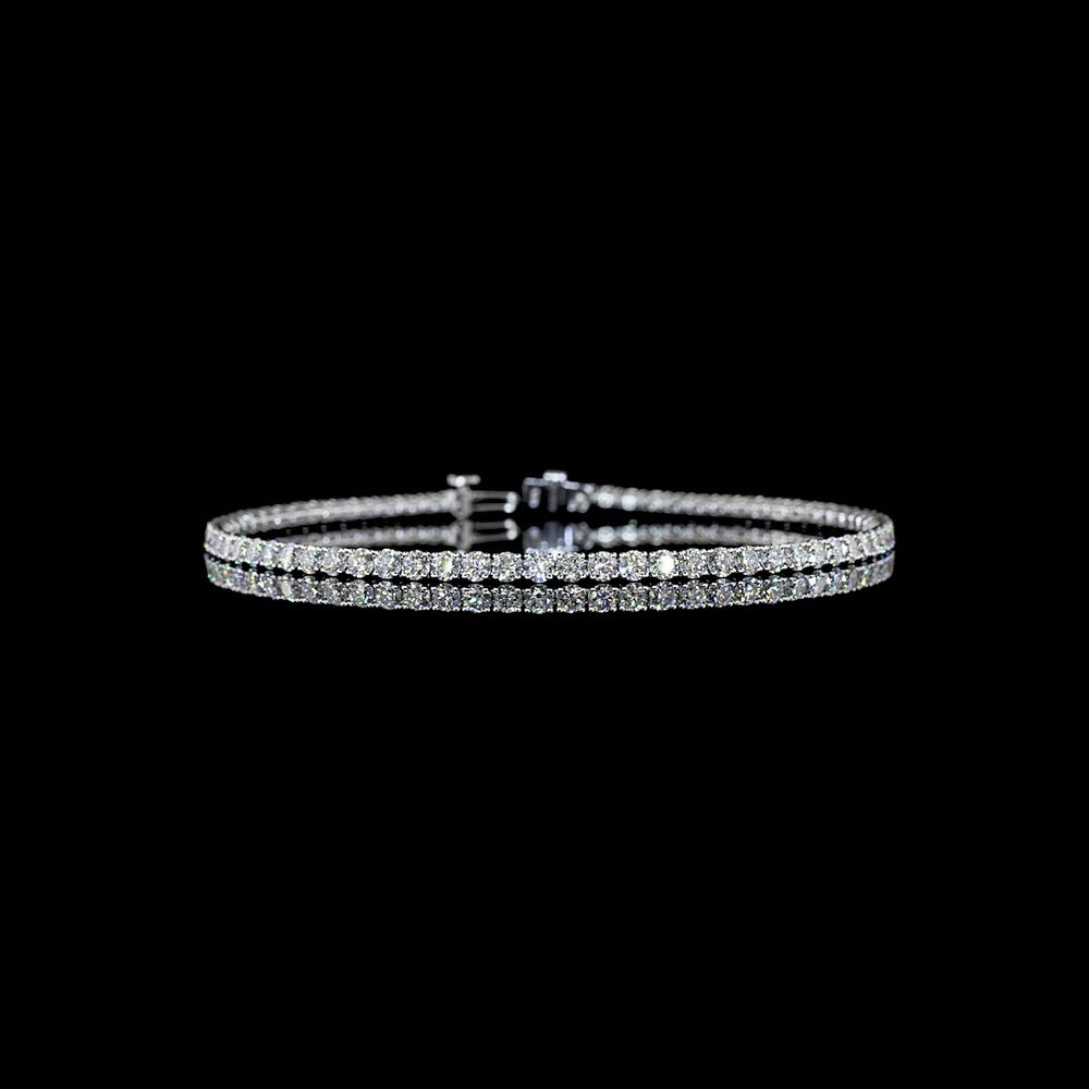14K White Gold 7" Tennis Bracelet with 71 Prong-Set Round Lab Diamonds - 6.00 Carats Total Diamond Weight, E-F Color, VS1 Clarity - Covaloro Fine Jewelry