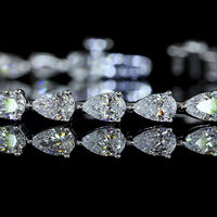 14K White Gold 7" Tennis Bracelet with East-West Set Pear Shape Lab Diamonds - 4.31 Carat Total Weight, E-F Color, VS1 Clarity - Covaloro Fine Jewelry
