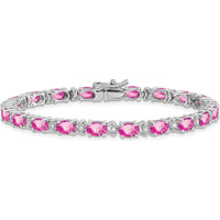 14K White Gold 7" Tennis Bracelet with Lab Created Oval Pink Sapphires and Round Diamonds - 0.54 Carats Total Sapphire Weight by Monteluci Fine Jewelry