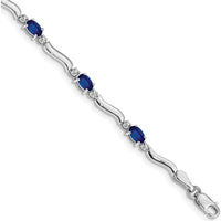 14K White Gold 7" Tennis Bracelet with Oval Sapphires and Round Diamonds - 0.21 Carats Total Sapphire Weight, 0.01 Carats Total Diamond Weight by Monteluci Fine Jewelry