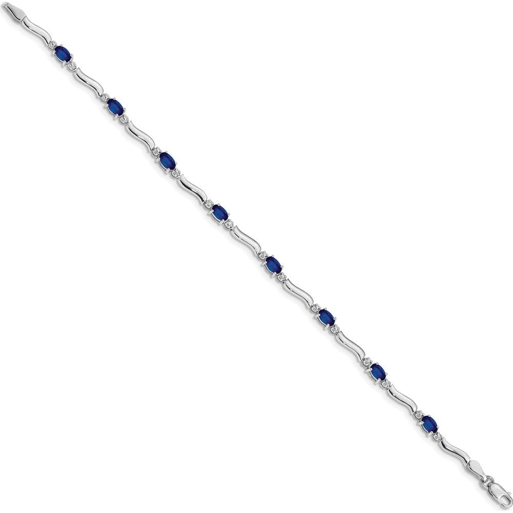 14K White Gold 7" Tennis Bracelet with Oval Sapphires and Round Diamonds - 0.21 Carats Total Sapphire Weight, 0.01 Carats Total Diamond Weight by Monteluci Fine Jewelry