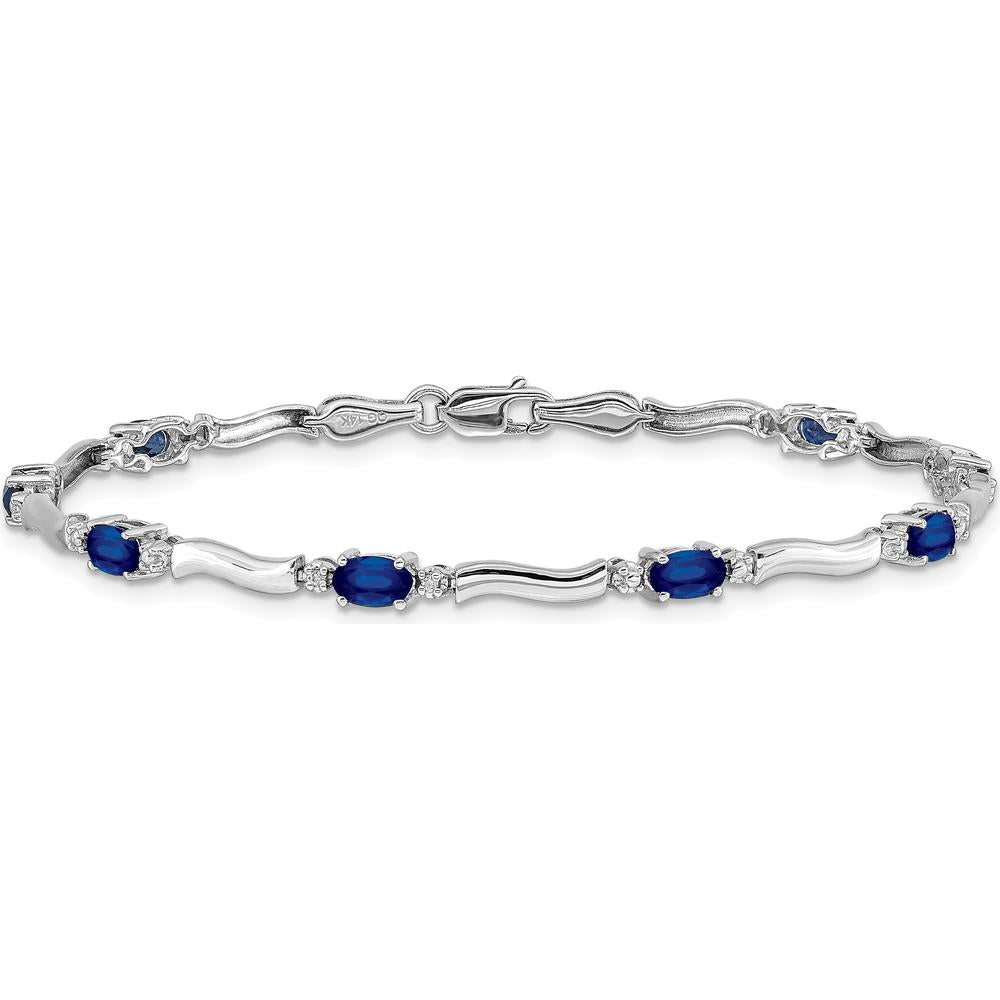 14K White Gold 7" Tennis Bracelet with Oval Sapphires and Round Diamonds - 0.21 Carats Total Sapphire Weight, 0.01 Carats Total Diamond Weight by Monteluci Fine Jewelry