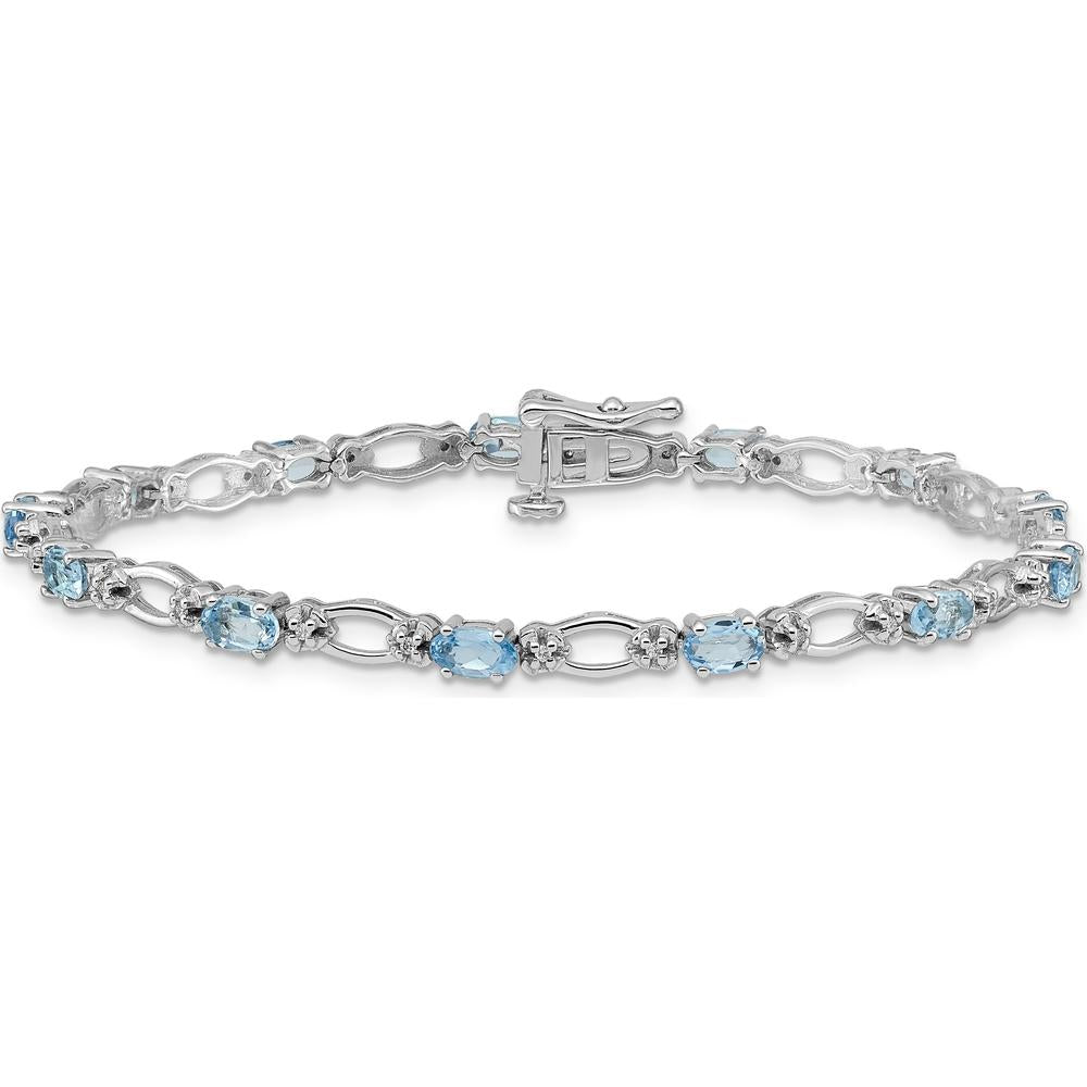 14K White Gold 7" Tennis Bracelet with Oval Swiss Blue Topaz and Round Diamonds - 0.30 Carats Total Topaz Weight by Monteluci Fine Jewelry