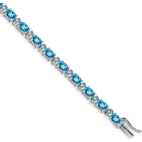 14K White Gold 7" Tennis Bracelet with Oval Swiss Blue Topaz and Round Diamonds - 0.56 Carats Total Topaz Weight by Monteluci Fine Jewelry