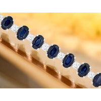 14K White Gold Alternating Oval Sapphire and Round Diamond Tennis Bracelet - 15.00 Carat Total Sapphire Weight and 2.12 Carat Total Diamond Weight - Royal Jewelry