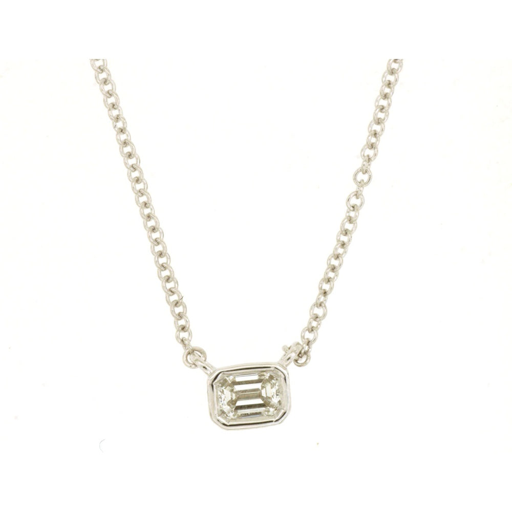 14K White Gold Bezel-Set Emerald Cut Diamond Solitaire Pendant Necklace - 0.12 Carat Total Diamond Weight - Royal Jewelry